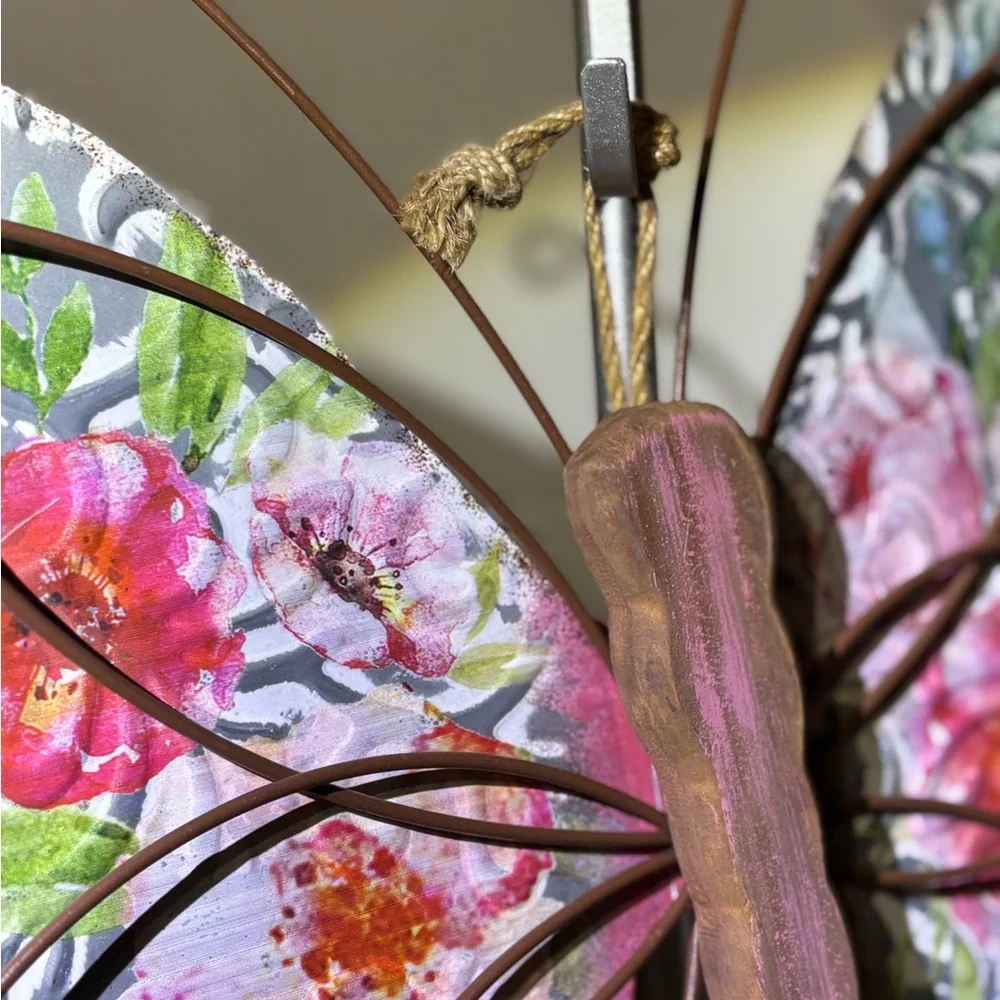 Metal butterfly w/wood accents Hanger on back Perfect for a patio or inside 18.5